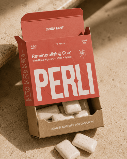 Perli Cinna Mint gum box open showing white gum pieces in kraft tray