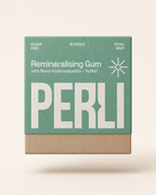 Perli Royal Mint remineralising gum box floating on ivory background