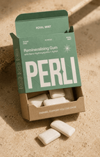 Perli Royal Mint gum box open showing white gum pieces in kraft tray