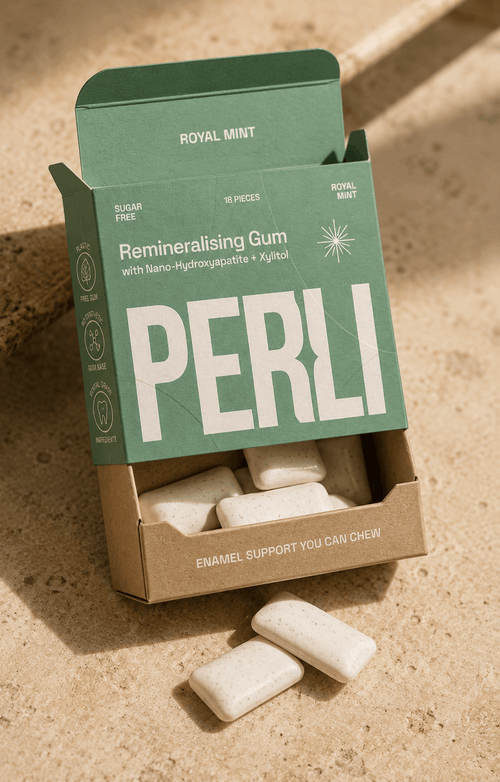 Perli Royal Mint gum box open showing white gum pieces in kraft tray